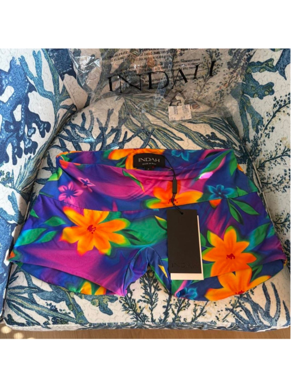 Indah Riz short in Love shack size small 

orange and purple floral print swim s